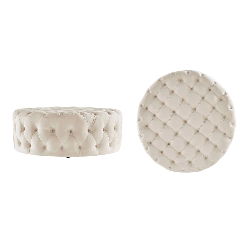 Pouf rond capitonné sur roulettes