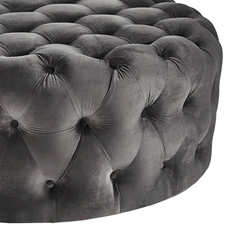 Pouf rond capitonné sur roulettes
